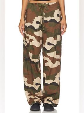 Good American Parachute Cargo Pants in a fatigue green camouflage